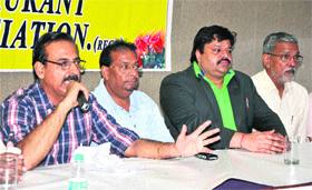 Members of the hotel association address a press conference in Bathinda on Monday.
