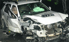 The mangled remains of the vehicles. 