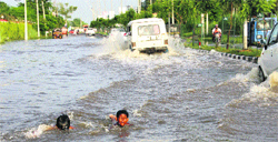 The waterlogged National Highway 10 near the JLN Canal after a downpour in Rohtak on Monday. Photo: Manoj Dhaka
