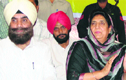 Former Chief Minister Rajinder Kaur Bhattal (right) addresses a press conference in Karnal on Monday. Tribune photo: Ravi Kumar