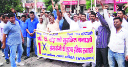 Sarvjati Sangharsh Samiti members protest against toll in Karnal on Monday. Tribune photo: Ravi Kumar