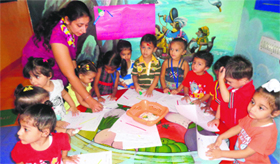 Students of Babies Paradise Playway School prepare rakhis to celebrate Raksha Bandhan in Ludhiana.