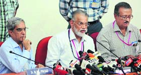 ISRO Chairman K Radhakrishnan addresses a press conference to announce the calling off of GSLV-D5 (inset) launch, in Sriharikota on Monday