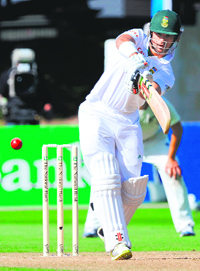 JP Duminy (84) hits a purple patch on Monday.