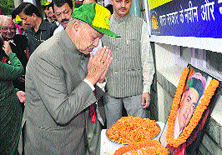 Chief Minister Virbhadra Singh pays floral tributes to late Rajiv Gandhis statue at the Sadbhawna Chowk in Chhota Shimla on Tuesday.