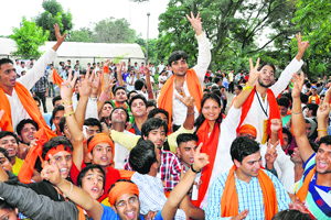 After the ABVP victory in the SCA elections, supporters of the party celebrate with winning candidates at PG College, Dharamsala.