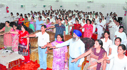 Students and staff members of Government College for Women take Sadbhavana pledge in Jammu on Tuesday. a Tribune photograph