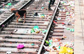 Garbage lying on the tracks beside platforms at the Amritsar railway station