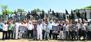 Bus operators protest at Sector 34 in Chandigarh on Wednesday.