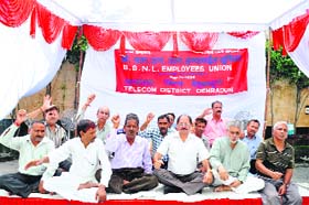 BSNL employees hold a protest in support of their demands in Dehradun on Wednesday