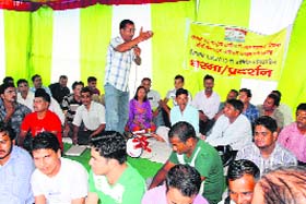 MNREGA employees hold a dharna in support of their demands in Dehradun on Wednesday