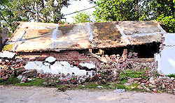 The illegal building after its demolition at Palika Colony in Ambala on Wednesday