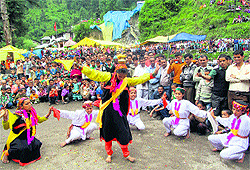 Artistes perform a Nati dance at a local fair at Multhan in Chhotta Bangal