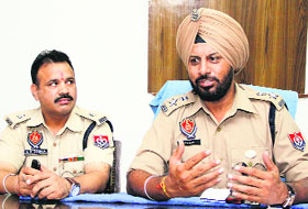 Deputy Commissioner of Police Jaspreet Singh Sidhu holds a press conference on Wednesday regarding the arrest of Dilpreet, son of Satwinder Kaur, who was murdered on Tuesday, in Jalandhar. 
