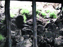 A piece of land that slipped due to the heavy rains that have lashed the region.