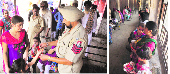 A jail guard checks a rakhi at Central Jail in Ludhiana on Wednesday; and (right) a woman waits in the corridor for her turn to tie a rakhi on her brother’s wrist. Tribune Photos: Himanshu Mahajan