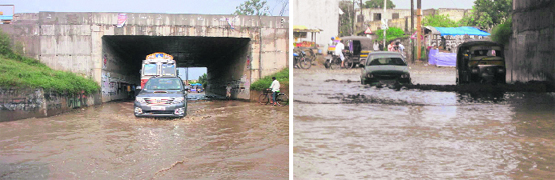 A waterlogged underpass on the National Highway 1 near Jugiana village. Tribune Photographs