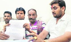 Members of the Dr BR Ambedkar Jan Kalyan Morcha at a press conference in Ludhiana on Wednesday. photo: inderjeet verma
