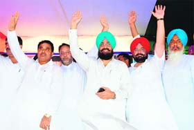 Pradesh Congress chief Partap Singh Bajwa (centre) with vice-president OP Soni (on his right) and brother Fateh Jang Singh Bajwa at a rally in Baba Bakala on Wednesday