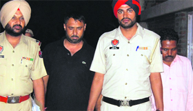 The accused in police custody in Mohali.