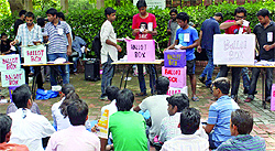 DU students cast their votes during a poll organised by AISA at the North Campus in Delhi on Thursday