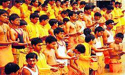 Young scholars take a pledge to cleanse the holy Ganga at the Rishikesh Ganga ghat on Thursday