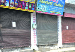 Some of the shops located on the Harbans Nagar road in Shastri Nagar, which were sealed by the Municipal Corporation, in Jalandhar. 