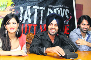 Actors Aman Dhaliwal, Esha Rekhi and Sippy Garewal promote their upcoming film Putt Jattan De in Jalandhar on Thursday.