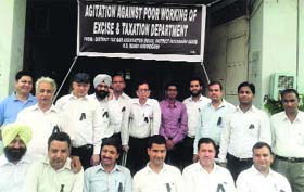 Members of the District Tax Bar Association hold a protest in Mandi Gobindgarh on Thursday