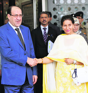 Iraq Prime Minister Nuri al-Maliki with Minister of State for External Affairs Preneet Kaur in New Delhi on Thursday. 