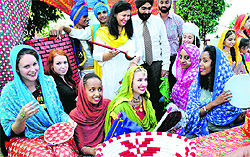 Students from Poland, Ethiopia, Norway and Russia dressed up in Punjabi attire during an exhibition at Play Ways Global Village in Patiala on Thursday