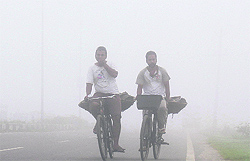 Fog enveloped the city early in the morning surprising the commuters in Amritsar on Friday