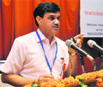 MP Poonia, Director, National Institute of Technical Teachers Training and Research, addresses a gathering in Chandigarh  on Friday. 