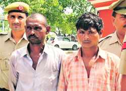 The accused in police custody in Panchkula on Friday. 