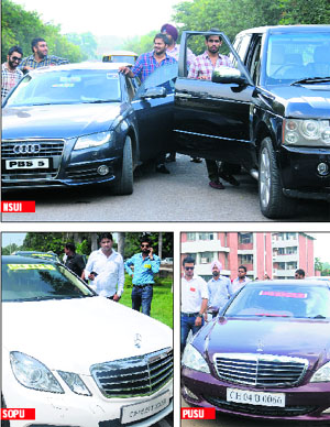 Supporters of various student organisations campaign in swanky cars on the Panjab University campus in Chandigarh on Friday.
