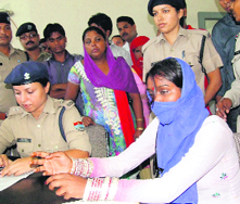 The daughter of the Rishinagar councillor talks to mediapersons in Dehradun on Friday.