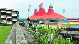 The railings divide the Govt College, Dharamsala, and the cricket stadium.