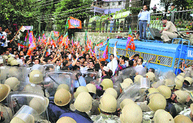 BJP workers clash with policemen during a protest near Vidhan Sabha in Shimla on Friday.