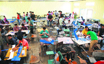 Students participate in the annual technical festival at the National Institute of Technology, Srinagar on Friday. 