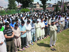 Residents offer funeral-in-absentia in Srinagar city for those killed in Egypt during a crackdown against members and supporters of Muslim Brotherhood. 