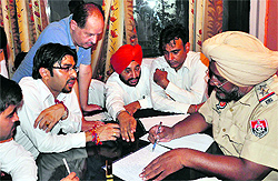 Lawyers lodge a complaint against an attack on their colleague in Ludhiana on Friday