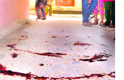Blood splattered on the floor where the vendor was attacked by youths at Pipliwala town of Mani Majra in Chandigarh on Saturday.