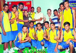 The basketball team of DAV (PG) College after winning the inter-college basketball tournament at Dolphin Institute in Dehradun on Saturday. A Tribune photo