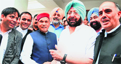 Former Chief Minister PK Dhumal with Capt Amarinder Singh, former Chief Minister of Punjab, outside the District Courts complex in Shimla on Saturday. Photo: Amit Kanwar