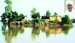 The damaged house of farmer Pritam Singh (inset), who reportedly drowned in the swollen Beas, at Rampur Gore village in Sultanpur Lodhi