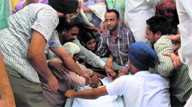 Grief-stricken relatives of Manpreet at his cremation at Majri Kishnewali village in Amloh on Saturday.