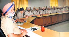Newly appointed Commissioner of Police Jatinder Singh Aulakh addresses police officials in Amritsar on Sunday