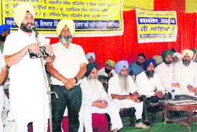 A leader addresses a rally organised by the Punjab Numberdar Union in Amritsar