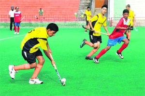 The final match between the Surjit Hockey Academy and the Chandigarh Football and Hockey Academy in progress during the SN Vohra Tournament at Sector 42 in Chandigarh on Sunday. 