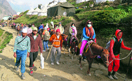 Pilgrims pass through Sangam, about 100 km from Srinagar, on their way to the Amarnath cave shrine.